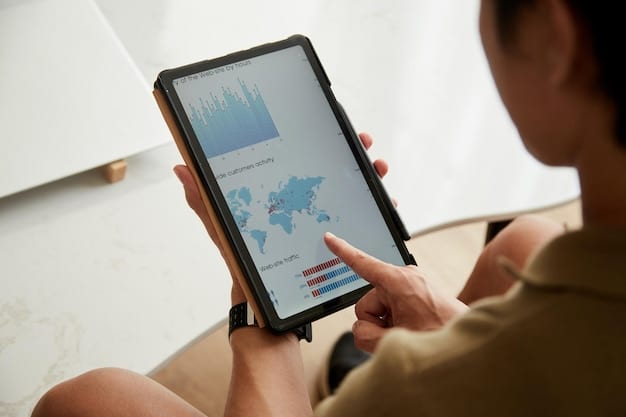 A close-up shot of hands using a modern CRM software interface on a tablet, showing customer data, interaction history, and sales pipelines.