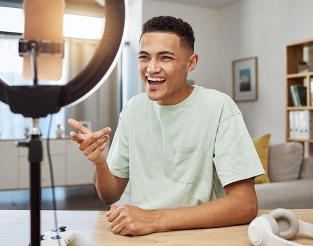 An eye-level shot of a content creator filming a short, engaging video for social media. The creator is smiling and interacting with the camera, with simple, aesthetic props in the background.