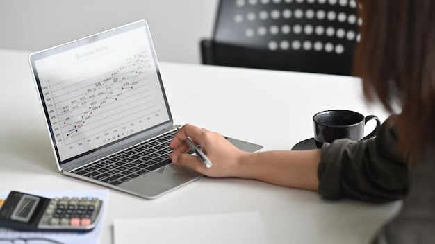 A close-up shot of a person's hands typing on a laptop, with a spreadsheet visible on the screen, suggesting financial analysis and preparation for a loan application. The lighting is professional, and the focus is on the hands and keyboard, emphasizing detail and effort.