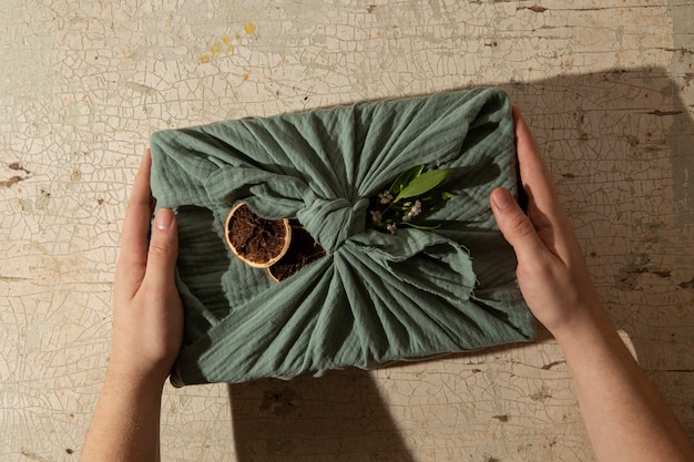 A close-up shot of a product with sustainable packaging, highlighting the recycled materials and eco-friendly certifications. The focus is on the tangible evidence of the brand's commitment to sustainability.